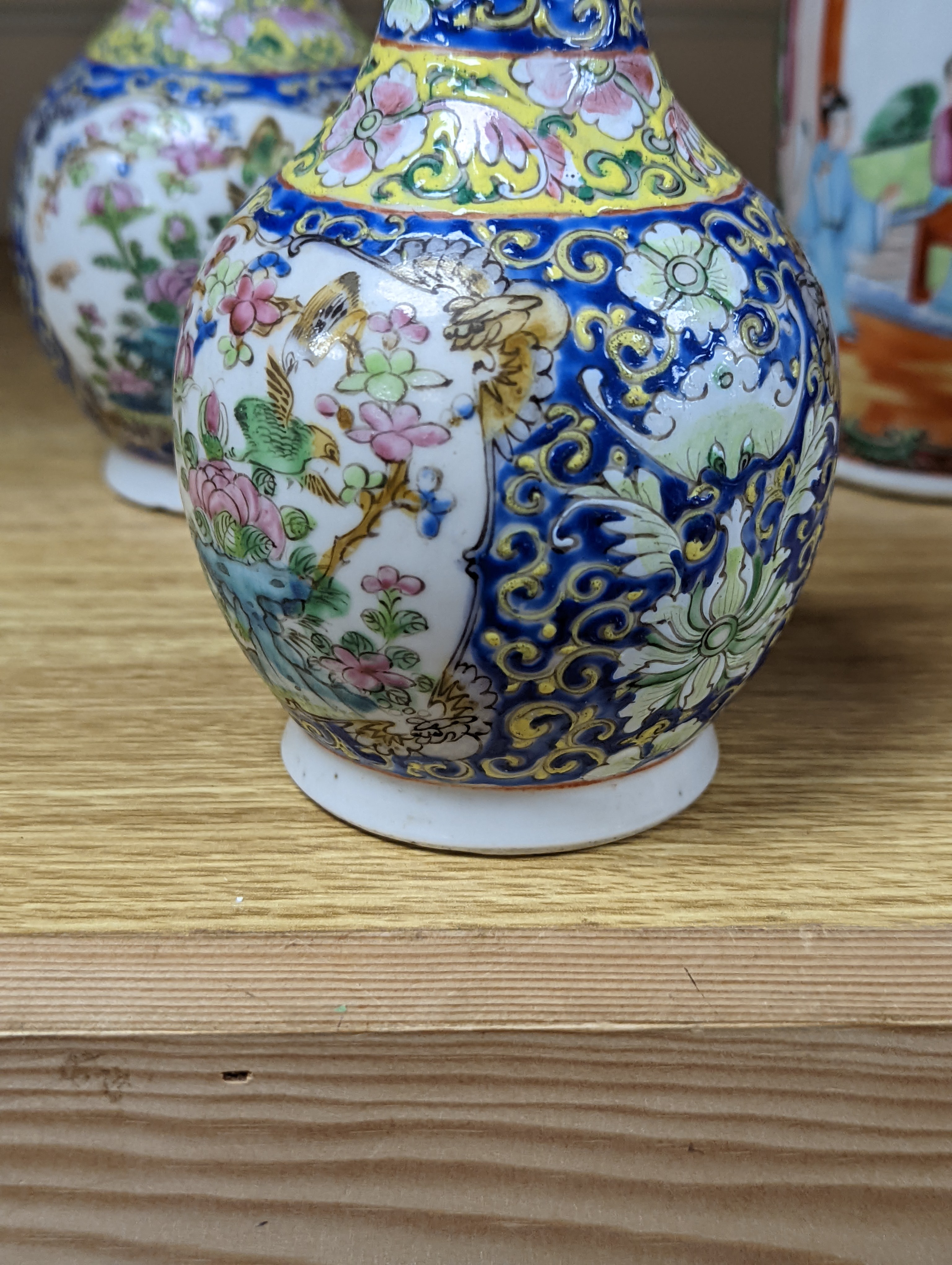 Four 19th century Chinese famille rose vases, 21cm